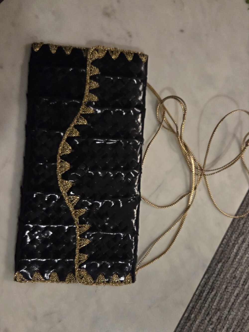 La Regale Black Woven Patent Clutch with Gold Trim and Chain